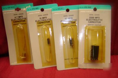 Assortment of 4- 1@ mfd electrolytic capacitors- axial