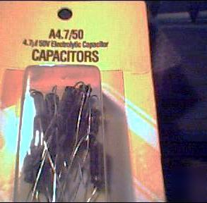 10% 50V 4.7UF axial capacitors