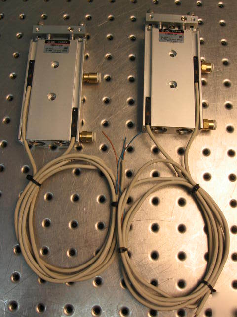 G37580 two smc CXSM15-50 pneumatic actuators