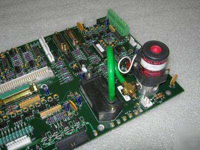 New circuit board assembly door interlock/vac intertie