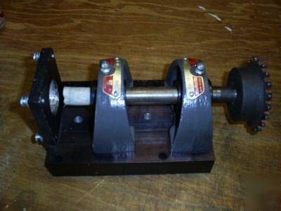 Sprocket drive mechanism for servo motors